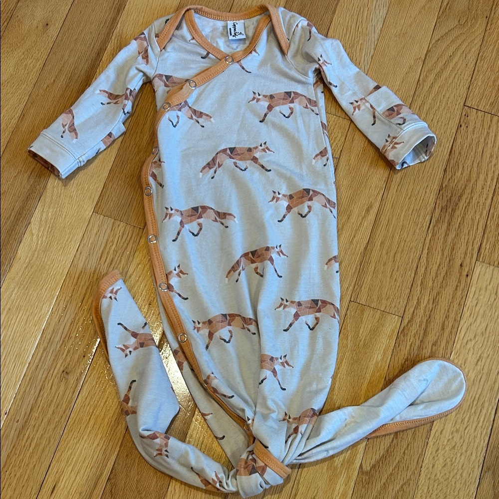 Copper pearl newborn sleeper gown in fox / swift print